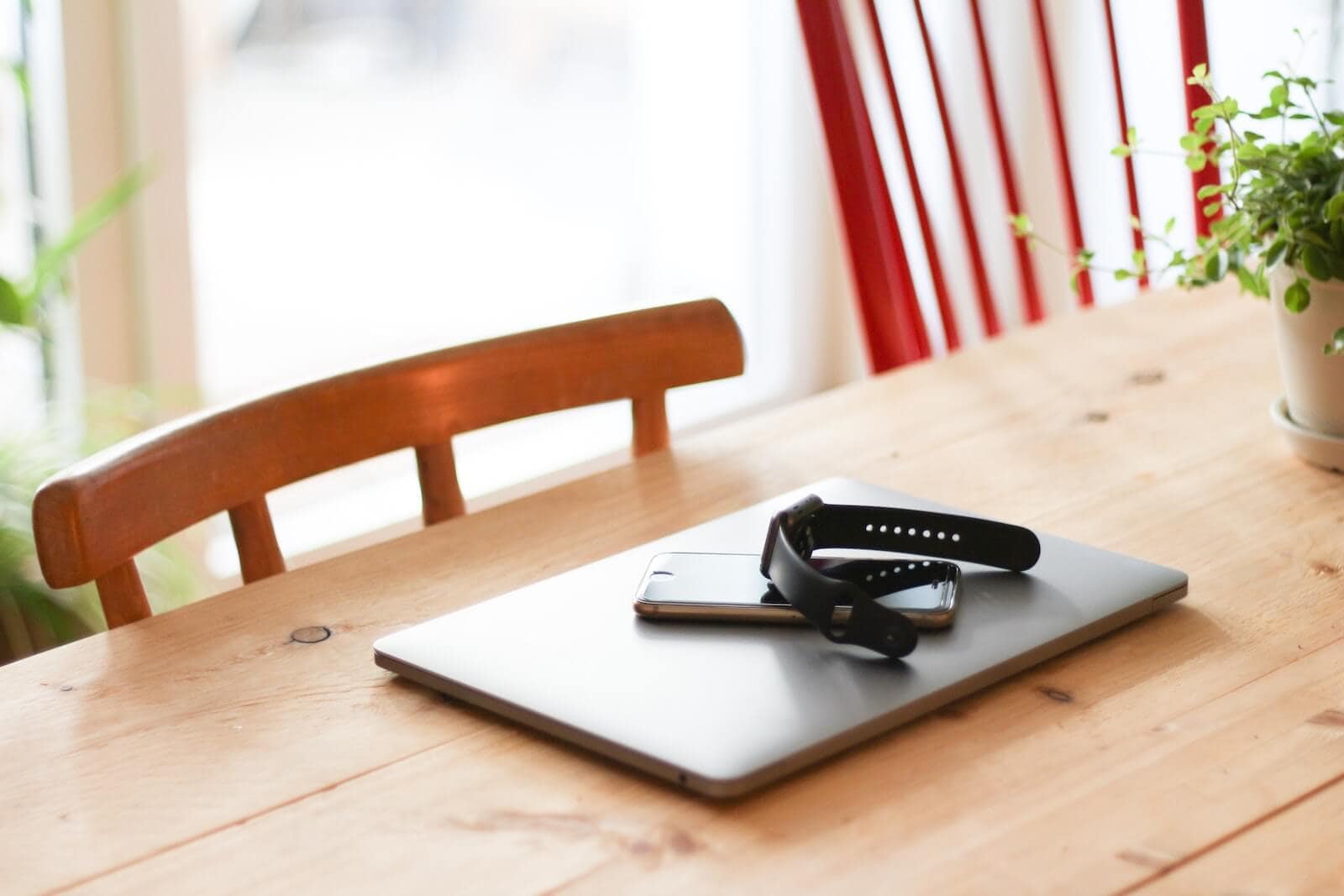 working from home at a kitchen table