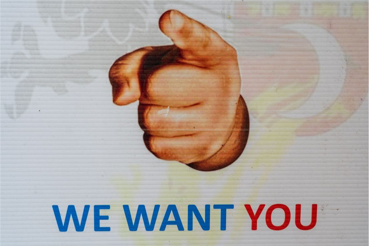 An image with text that says "We want you"